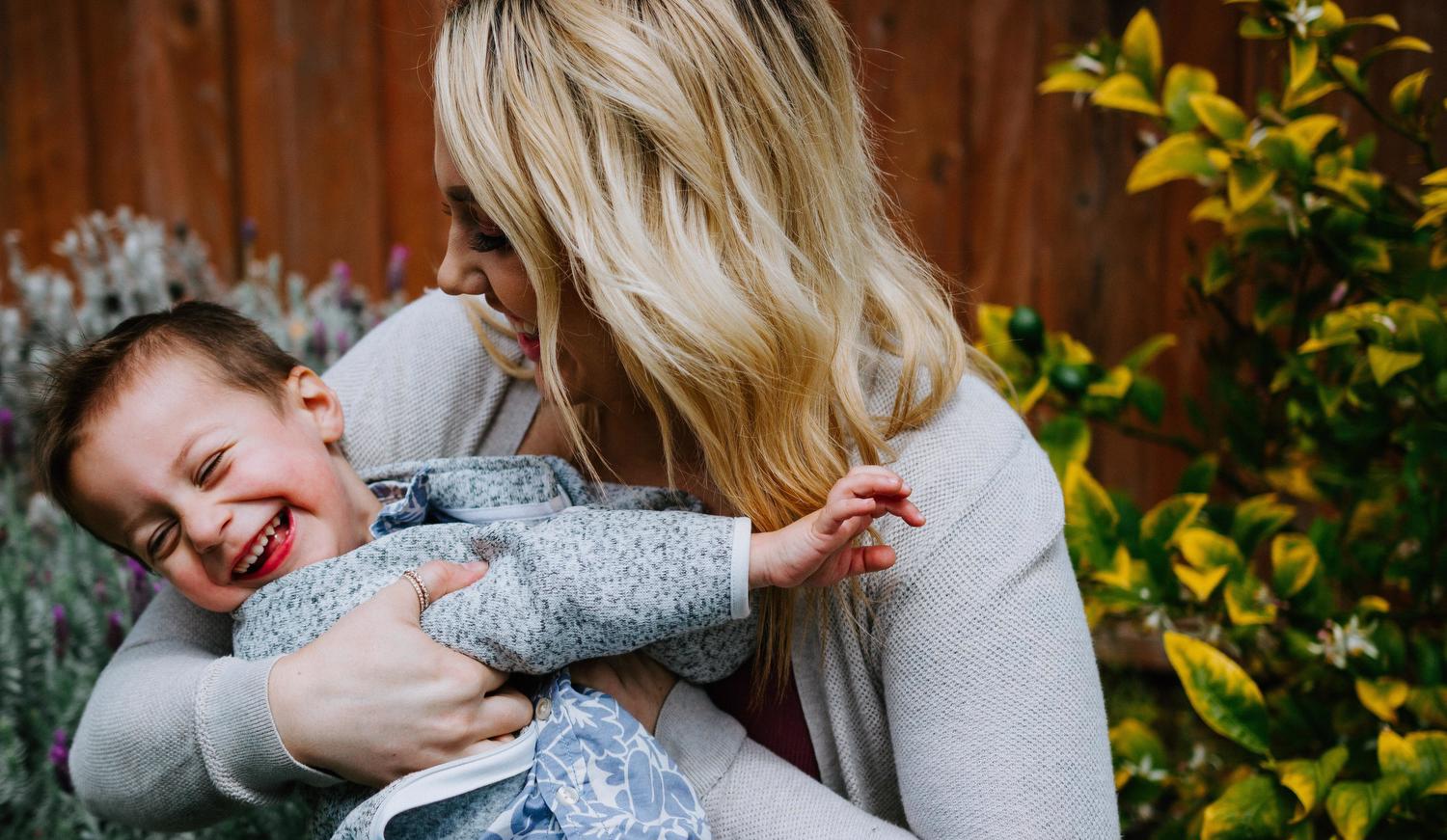 mom hugging child