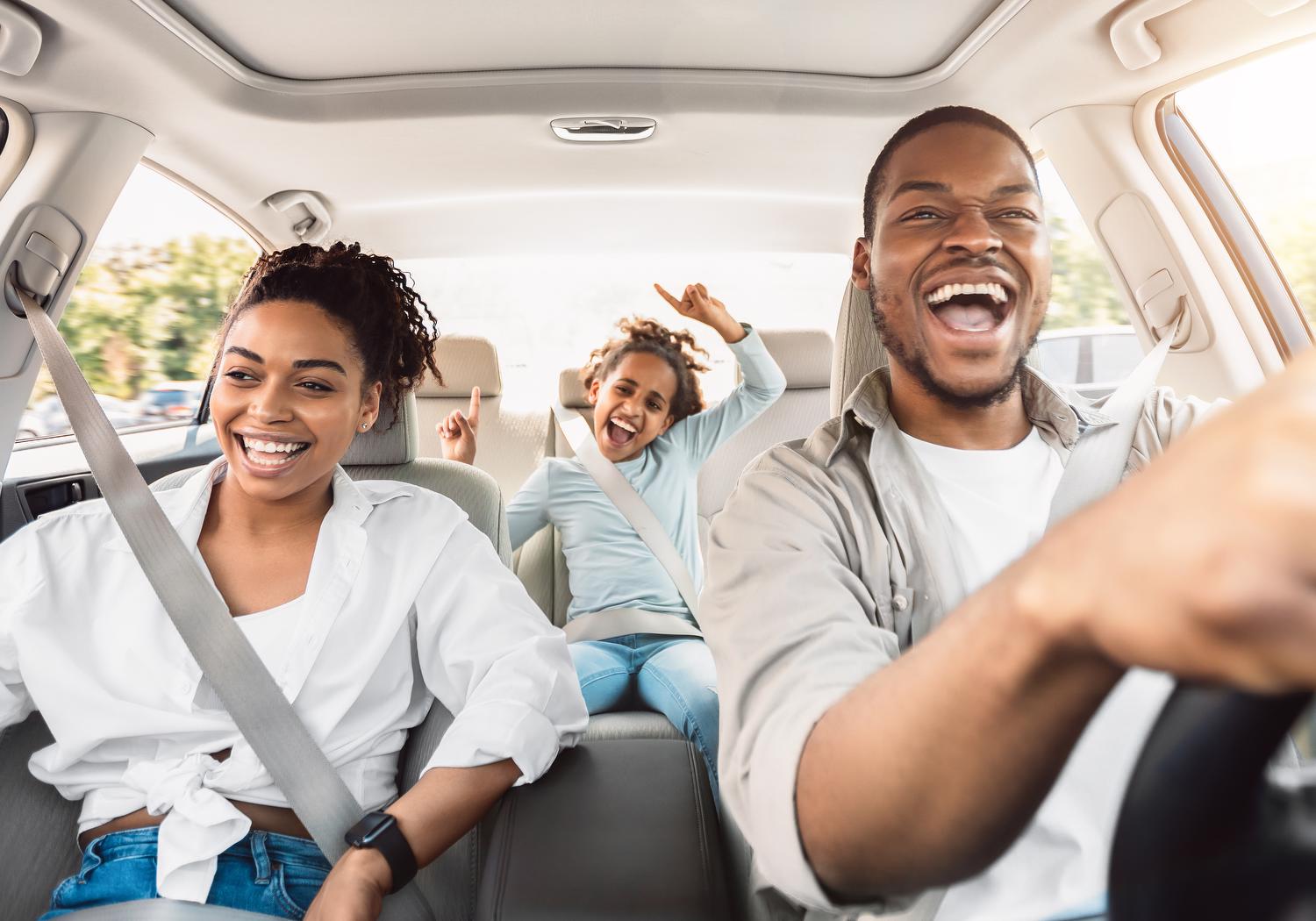 family in car