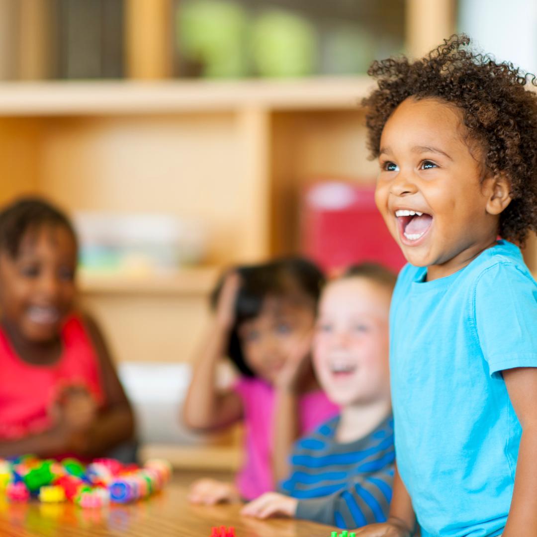 Preschool child laughing