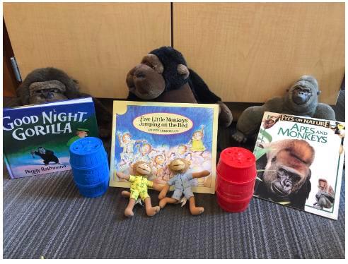 Monkey stuffed animals and books