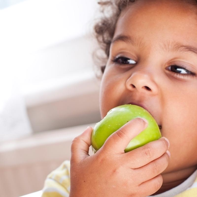 Child with apple