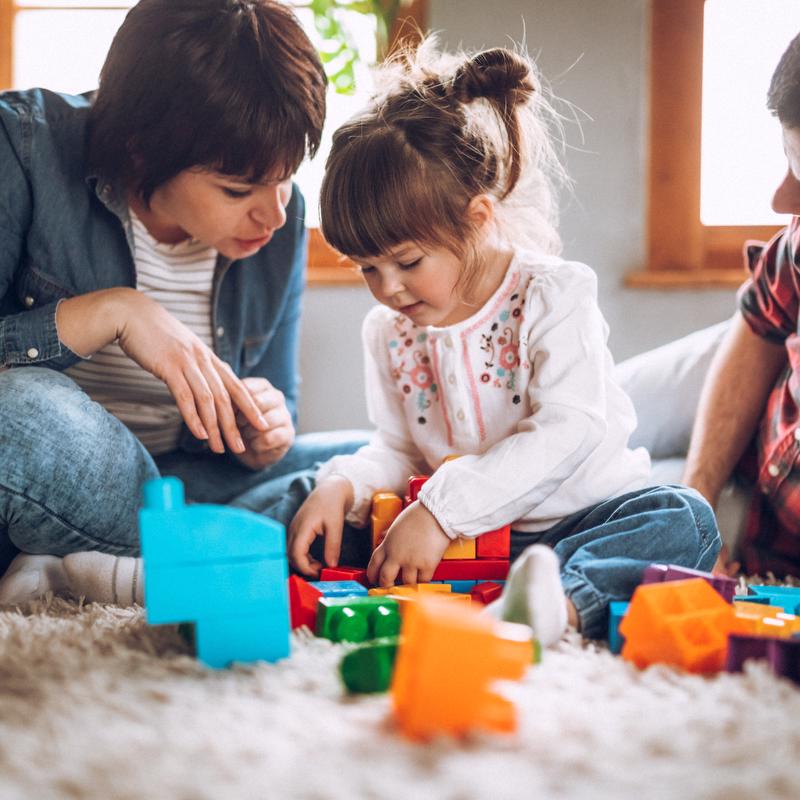 mom building with daughter